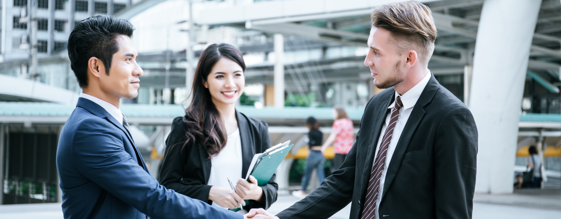 Business leaders shaking hands, cementing a successful outsourcing partnership for key business process functions